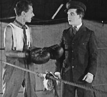 Watch Knocking Out Knockout Kelly (Short 1916)